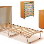 bed with mattress in the form of a cabinet