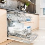 Built-in dishwasher fits harmoniously into the surrounding interior